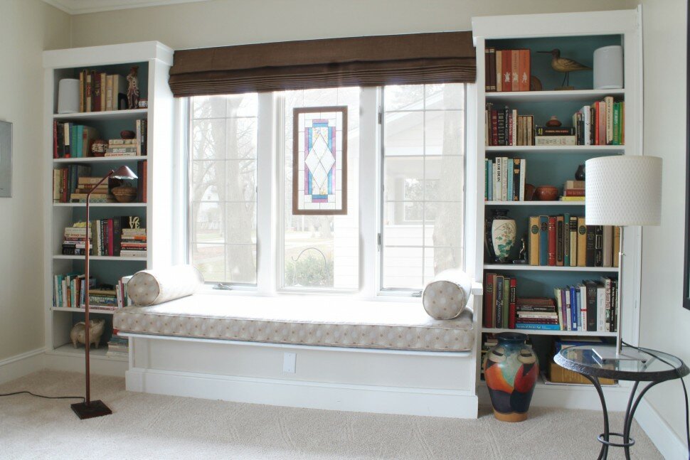 built in bookshelves and window seat
