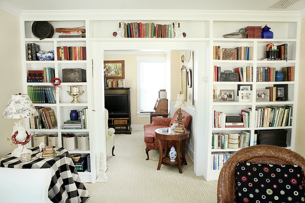 built in bookshelves around a door
