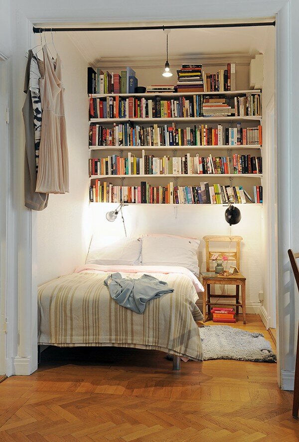 built in bookshelves around bed