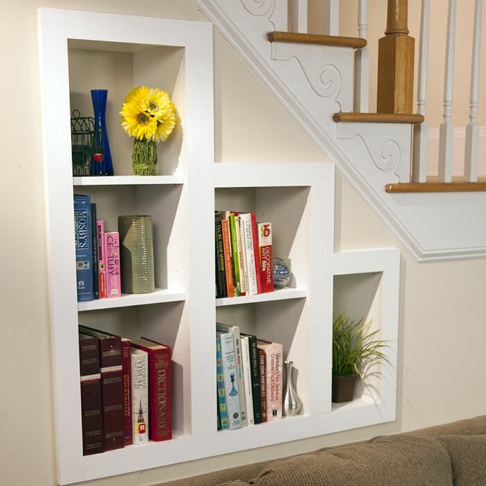 built in bookshelves between studs